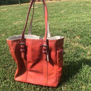 pink leather coach shoulder bag